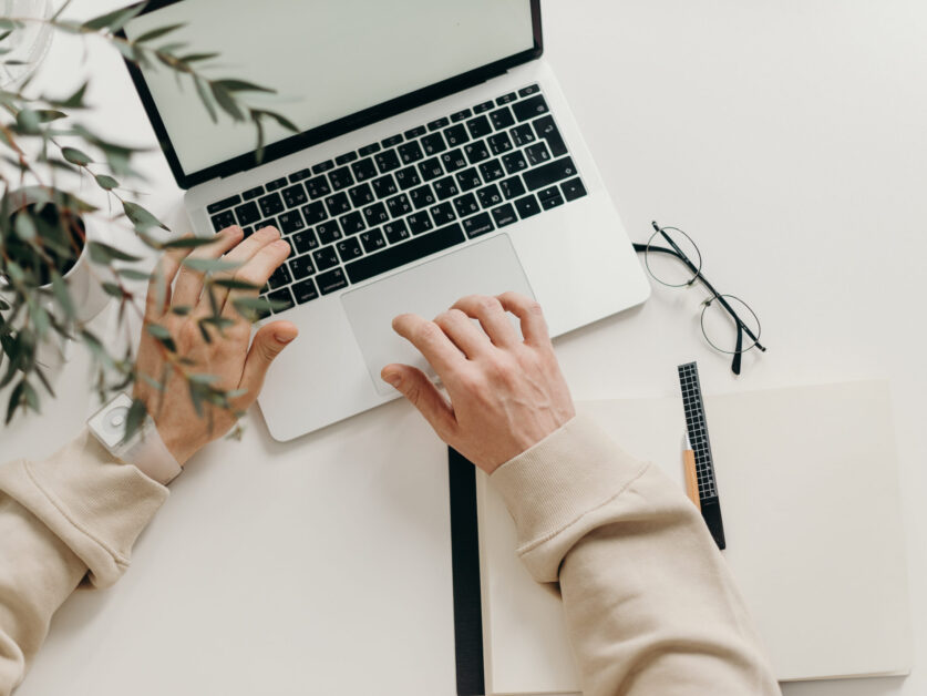 pexels-photo-4065876 Person in Beige Long Sleeve Shirt Using Macbook Pro